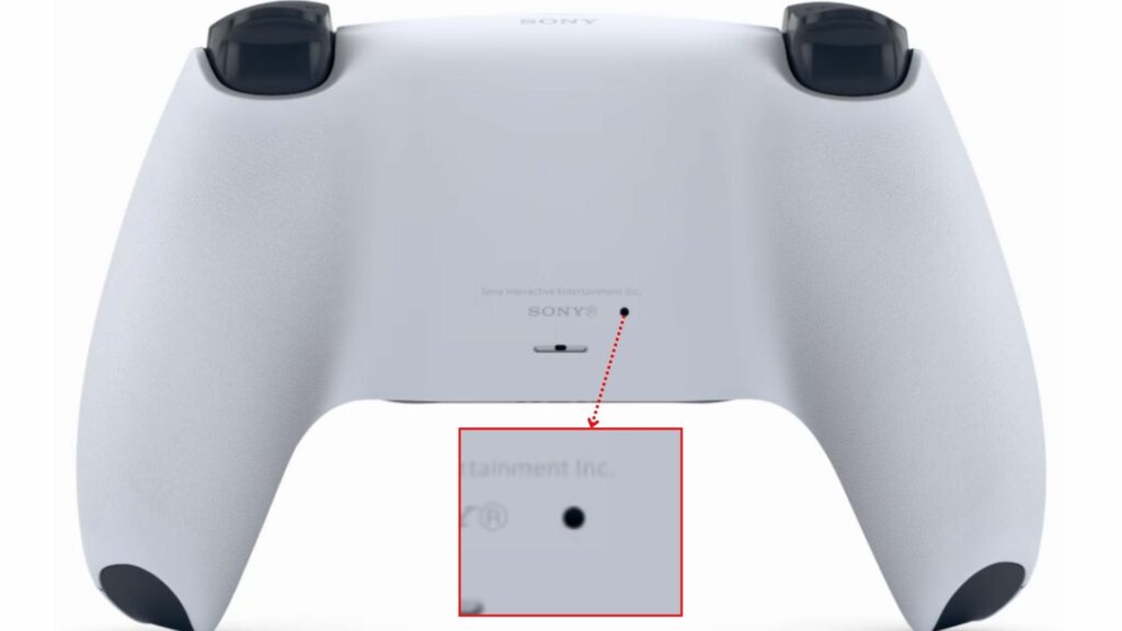 Reset PS5 controller button in a small hole on back side of controller